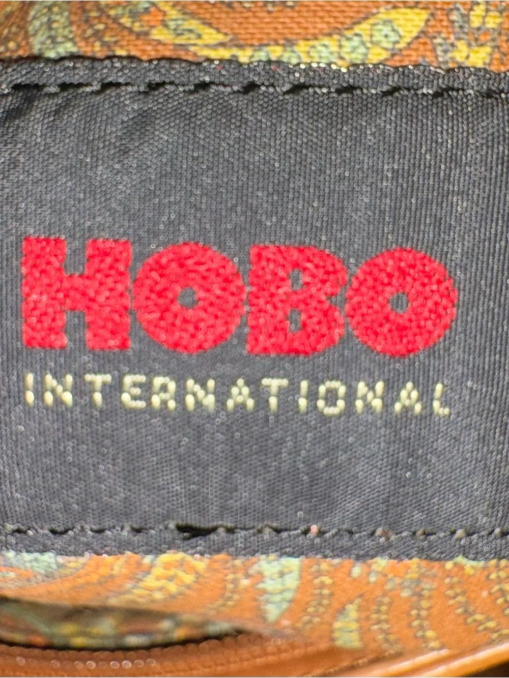 HOBO International Tan Leather Foldover Bow O-Ring Clutch Vintage